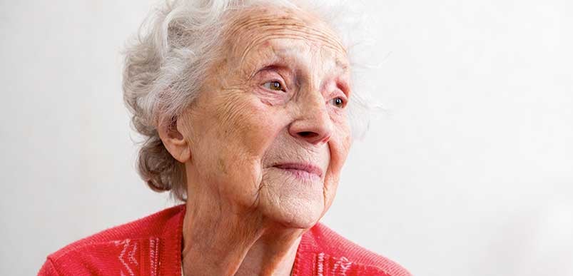 A headshot of an elderly woman